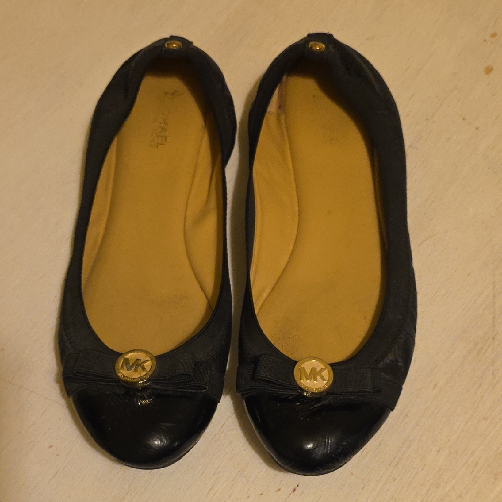 Michael Kors Black and Gold Loafers‎